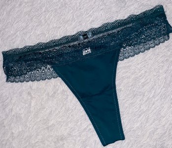 Cheerleader dark green thong with lace trim $26
