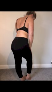 Worn black leggings
