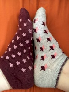 Well worn, sweaty, odd socks