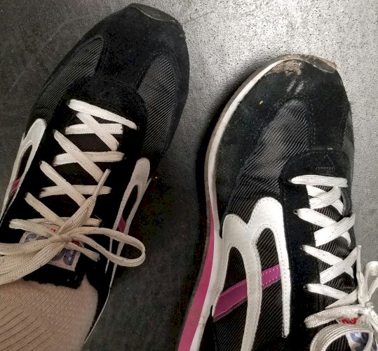 Pink and black sneakers