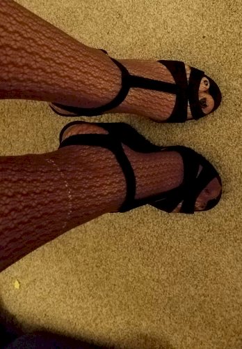 Black strappy wedge heels